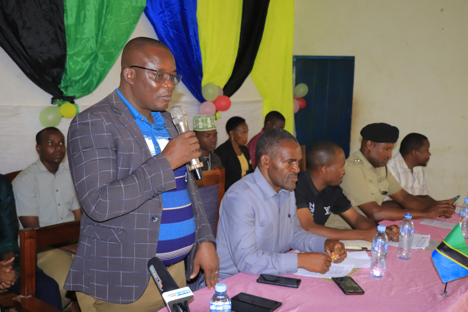 The District Education Officer of Tabora speaking on behalf of the Director of Tabora Municipality during the Mafanikio campaign "No Child Left Behind - Quality Education for All."