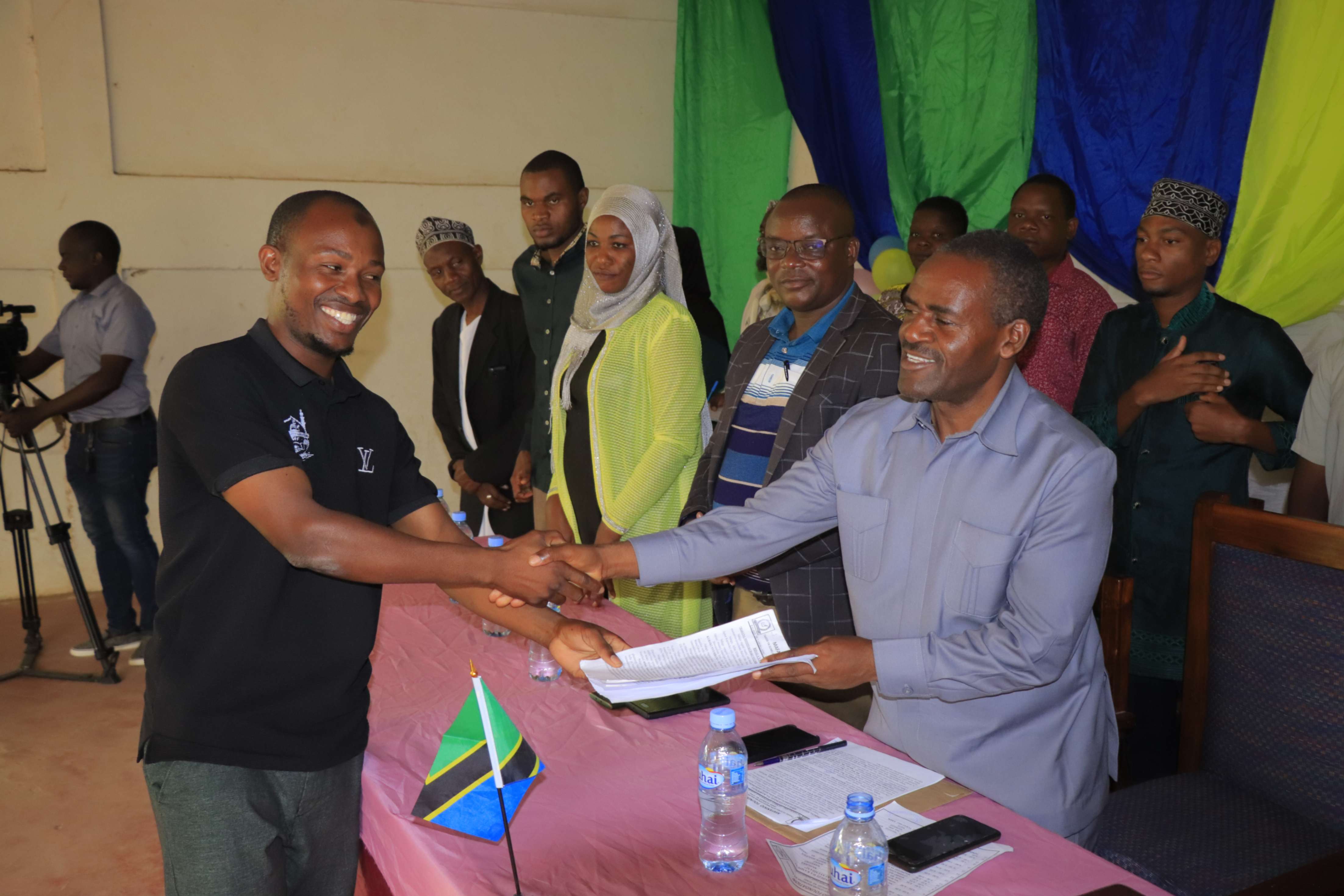 The Regional Education Officer, Mr. J.J. Kaponda, on behalf of the Regional Commissioner, congratulates the Chief Executive Officer of Mafanikio Foundation, Mr. Muhammed Mikombe, for the excellent work done by the organization and the launch of the "No Child Left Behind" campaign.